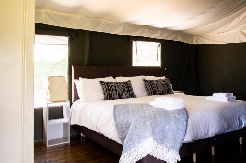 Canvas & Campfires, Luxury Safari Tent Glamping, only Seren Tent has a hot tub in Llanwenog