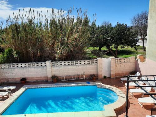 Cosy apartment close to the beach and heated pool.