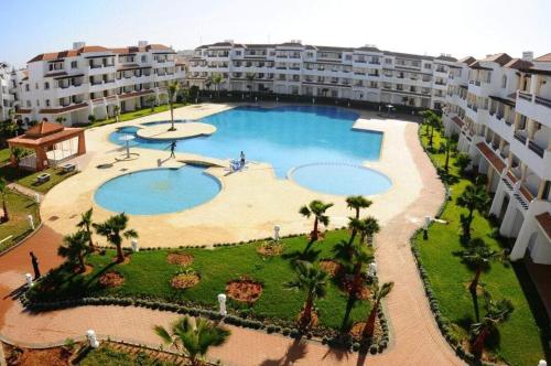 Swimming pool, Bel appartement familial vue mer Garden beach in Sidi Rahal