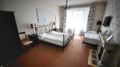 Triple Room with Lake View with conservatory