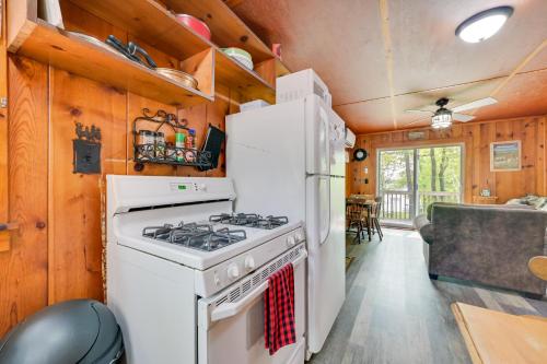 Cozy Carp Lake Cottage with Dock, 4 Kayaks and Fire Pit