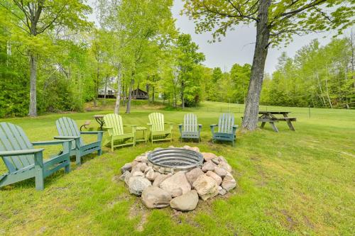 Cozy Carp Lake Cottage with Dock, 4 Kayaks and Fire Pit