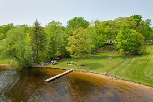 Cozy Carp Lake Cottage with Dock, 4 Kayaks and Fire Pit