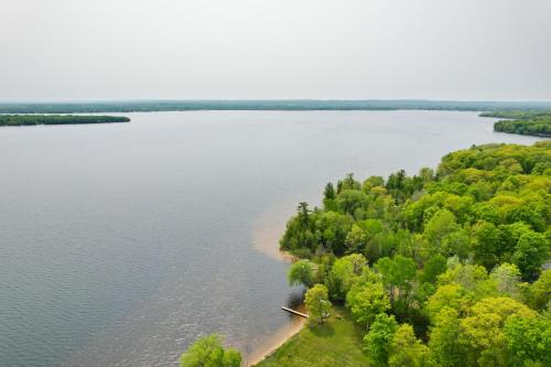 Cozy Carp Lake Cottage with Dock, 4 Kayaks and Fire Pit