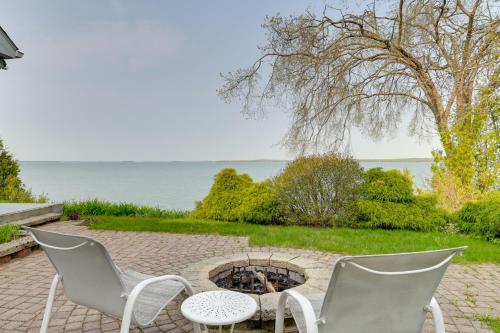 Lakefront De Tour Village Home with Deck and Fire Pit!