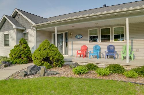 Lakefront De Tour Village Home with Deck and Fire Pit!