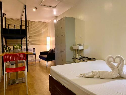 Burgos Hub Hostel, Манила