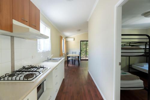 Kitchen, Tiona Holiday Park in Taree