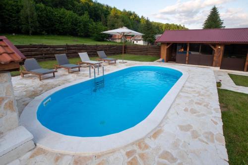 Holiday Home Nina with a heated pool