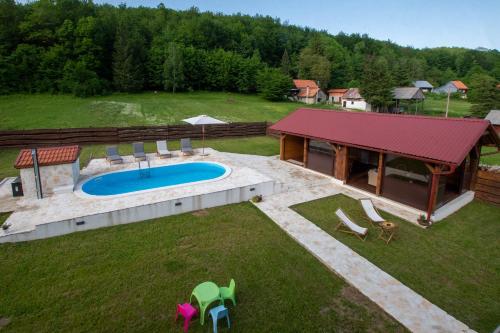 Holiday Home Nina with a heated pool