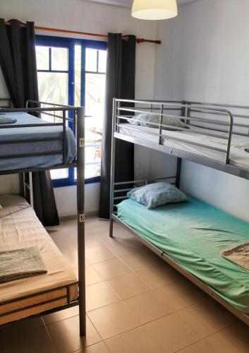  Yokomosurf camp in Famara