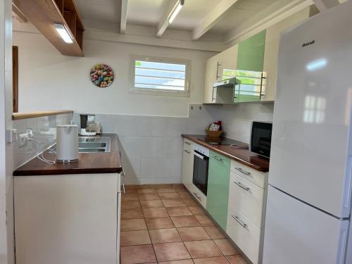 Κουζίνα, La Belle Epoque (3*) - Maison avec vue sur mer à Bouillante (La Belle Epoque (3*) - Maison avec vue sur mer a Bouillante) in Μποιγιάντ