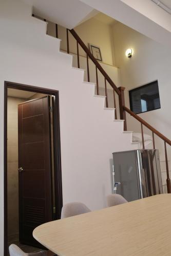 Shared lounge/TV area, The LINs House in Guiren District