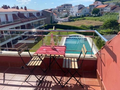 Ático con terraza, piscina y gimnasio