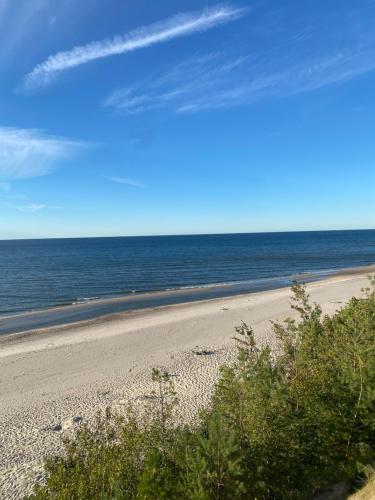 Klimatyczny domek z drewna nad morzem in Poddabie