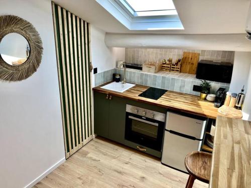 studio cosy sous les toits in St Barnabe