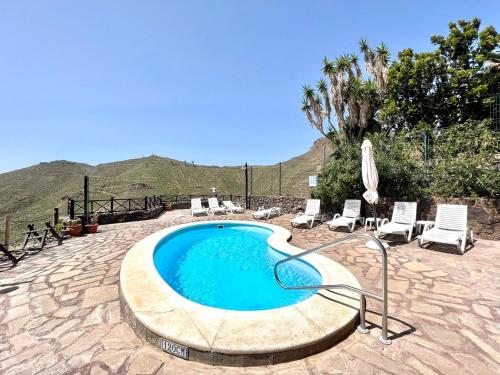 Apto en una casa rural, con cocina, piscina, barbacoa compartidas y vistas en Sur de Tenerife