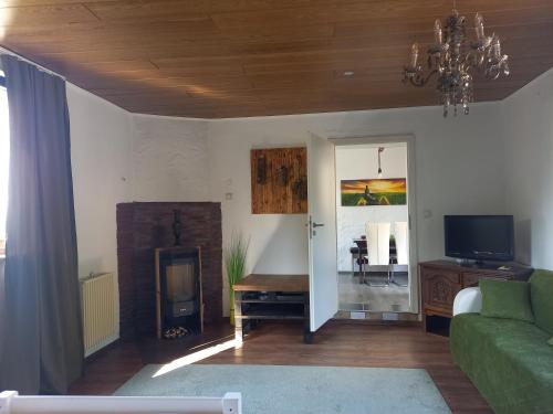 共用Lounge/電視區, Ferienwohnung am Schwedenberg , Trimberg in 埃爾費爾斯豪森