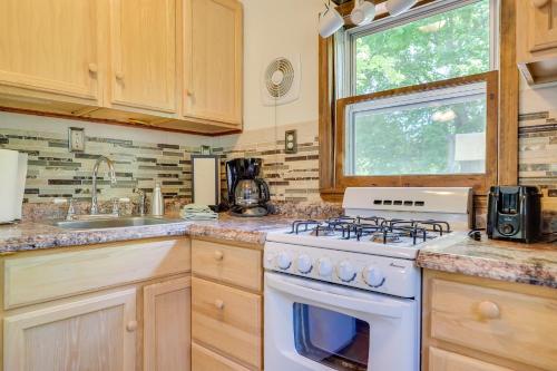 Charlevoix Cabin with Patio and Grill - Steps to Lake! in Charlevoix, USA