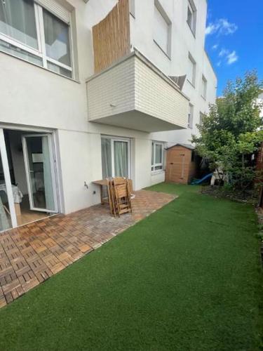 Bel appartement terrasse+jardin - Location saisonnière - La Courneuve