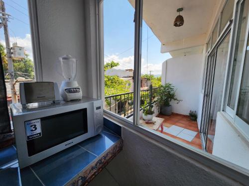 1 BR APT with AC , TV , wi-fi near DT and beach, Сиуатанехо (фото 10)