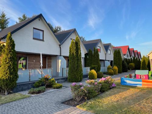 Domki Letniskowe Sloneczny Ogród – Wladyslawowo, NY