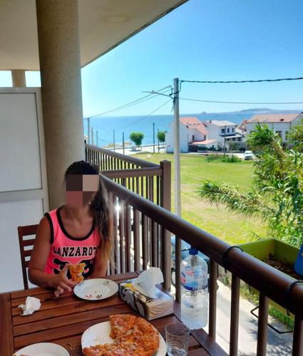 Apartamento delante de la playa. in A Revolta