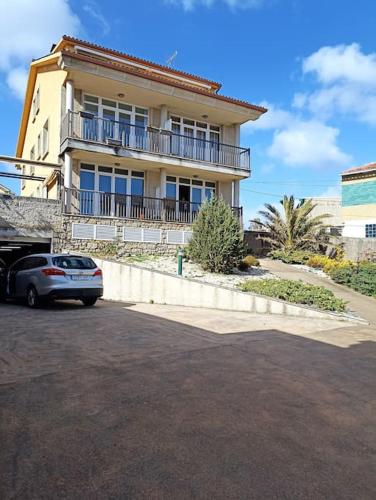 Apartamento delante de la playa. in A Revolta