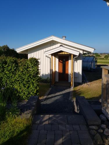 Stuga i Gamla-köpstad - Accommodation - Träslövsläge