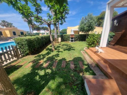 FANTASTICO apartamento con jardín privado y piscina PARA 4 PERSONAS en Cap d'artrutx en Ciutadella de Menorca