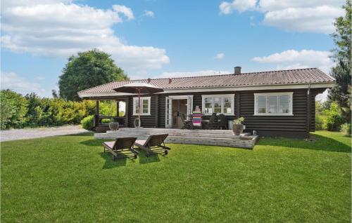 3 Bedroom Cozy Home In Dronningmlle