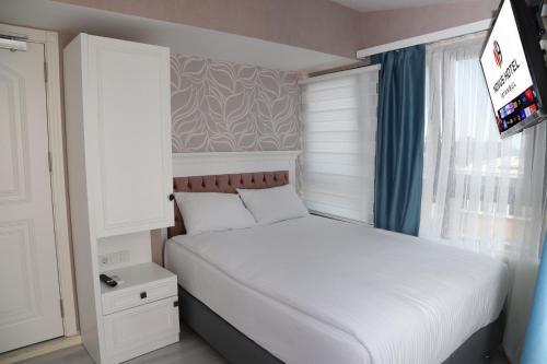 Novus Hotel Room Type - Triple Room with Balcony