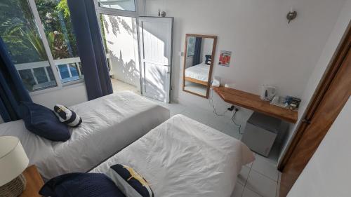 OEManagement Rooms in Roseau