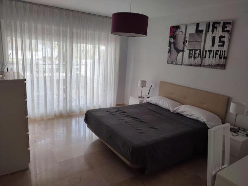 Sunny Guadalmina Apartment - Tap to explore photos