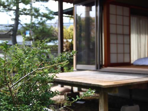 Japanese-Style Family Room with Garden View image 2