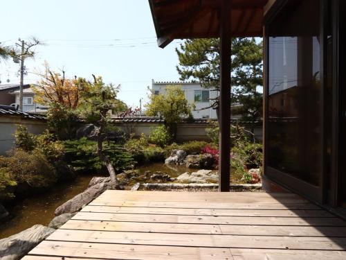 Japanese-Style Family Room with Garden View image 1