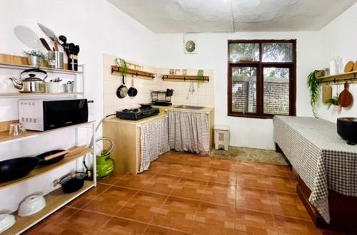 Kitchen, Lazuardy Syariah Park and Villa in Cisarua