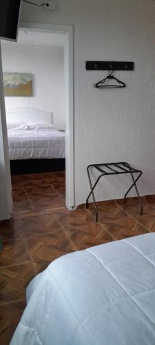 Deluxe Queen Room with Two Queen Beds image 3