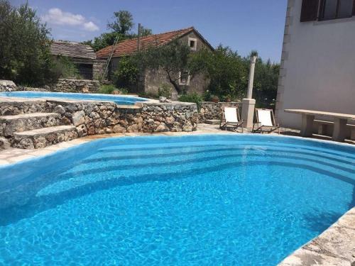 Apartments with a swimming pool Zrnovo, Korcula - 21436