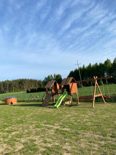 Dārzs, Agroturystyka '' U Adasia i Marysi '' - Domek nad jeziorem in Olpuch