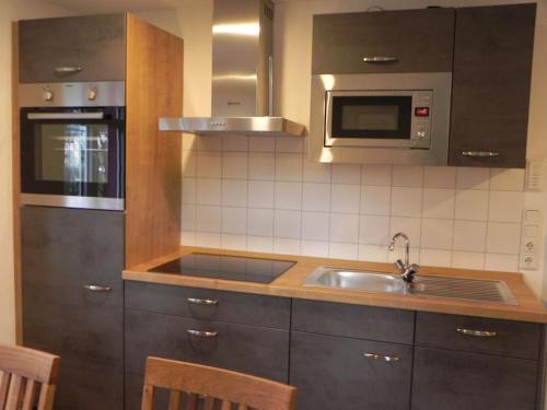 Cocina, Ferienwohnung Tiererlebnishof Obermühle (Ferienwohnung Tiererlebnishof Obermuhle) in Bad Orb