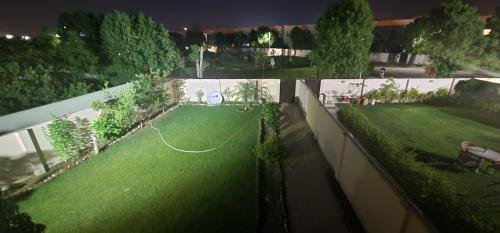 Haven Lodge Lahore by Haven Holiday Homes - 4BR Vacation Home with Lawn & Park Access - image 2