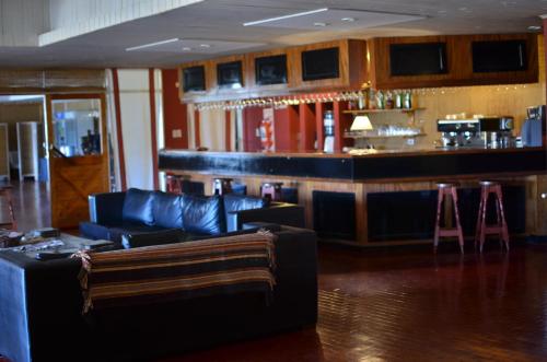 共用Lounge/電視區, Hotel y Cabanas del Nevado in 卡比亞夫