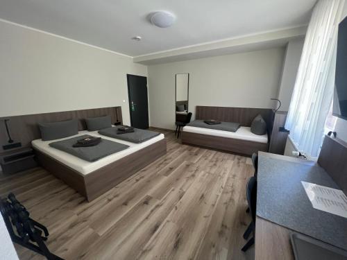 Dreibettzimmer