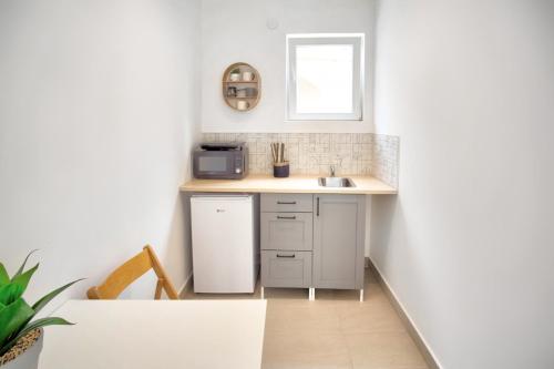 Kitchen, BOKELJSKI CVIJET apartmani in Baosici