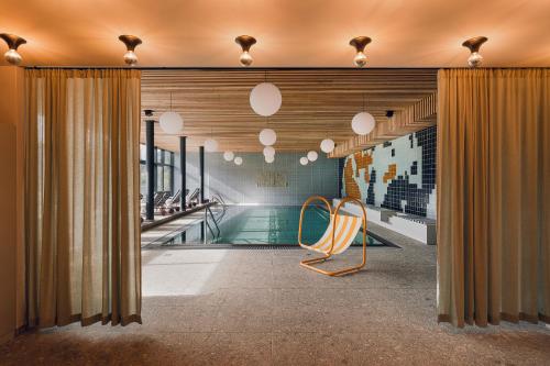 Swimming pool, The Comodo Bad Gastein, a Member of Design Hotels in Bad Gastein