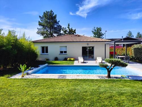 Villa entre ville et océan avec piscine chauffée - Location, gîte - Saint-Aubin-de-Médoc