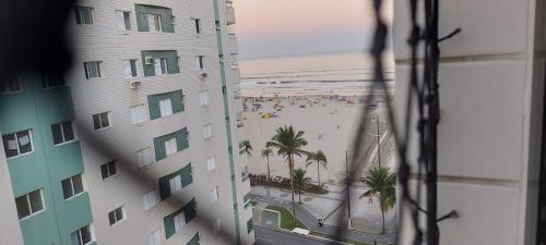 Apartamento beira mar na Praia Guilhermina,ambiente familiar