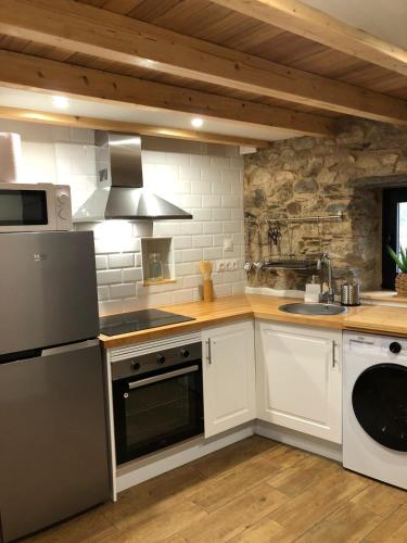 virtuve, Apartamentos El Arroyo in Boal