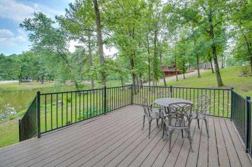 Lakefront Arkansas Home with Dock and Sunroom